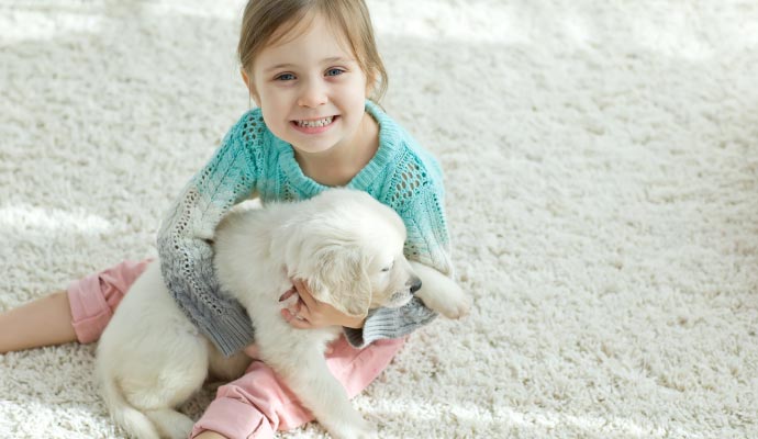 Children playing on clean carpet