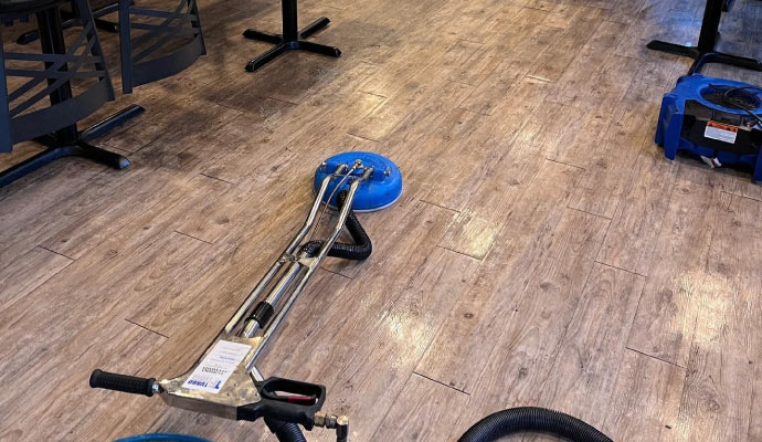 Commercial floor cleaning in progress